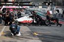 Haas F1 mechanics wheel Romain Grosjean back into the garage