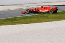 Sebastian Vettel runs wide in the Ferrari