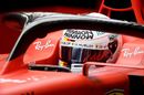 Sebastian Vettel looks on from the Ferrari cockpit