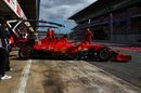 Charles Leclerc pulls out of the Ferrari garage