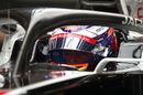 Romain Grosjean looks on from the Haas cockpit