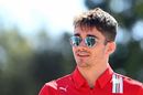 Charles Leclerc looks relaxed in the Paddock