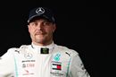Valtteri Bottas poses for a photo in the Paddock