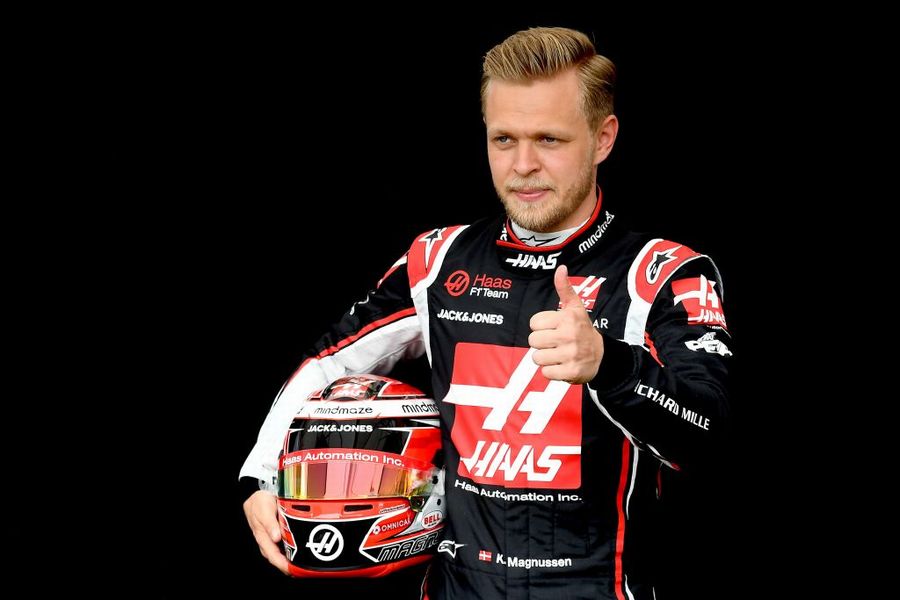 Kevin Magnussen poses for a photo in the Paddock