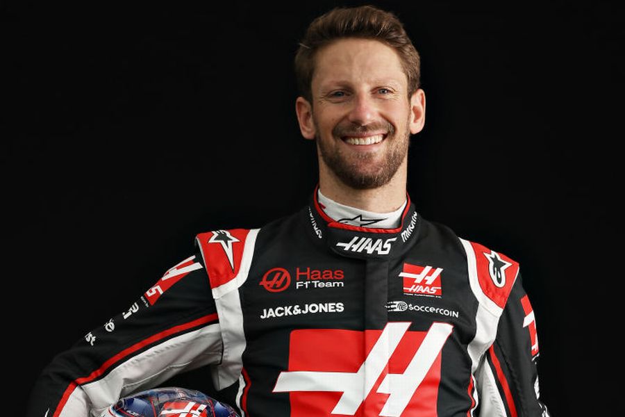 Romain Grosjean poses for a photo in the Paddock