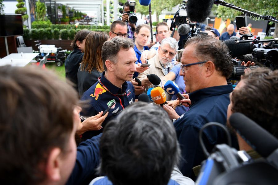 Christian Horner talks to the media in the Paddock