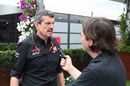 Guenther Steiner talks to the media in the Paddock