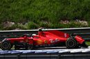 Sebastian Vettel with a broken rear wing