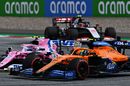 Lando Norris and Lance Stroll battle for position