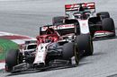 Kimi Raikkonen and Romain Grosjean battle for position
