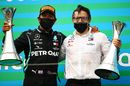 Lewis Hamilton celebrates with race engineer Peter Bonnington on the podium