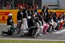 Lewis Hamilton and fellow drivers make a statement on the track as they 'take a knee' in support of the Black Lives Matter movement