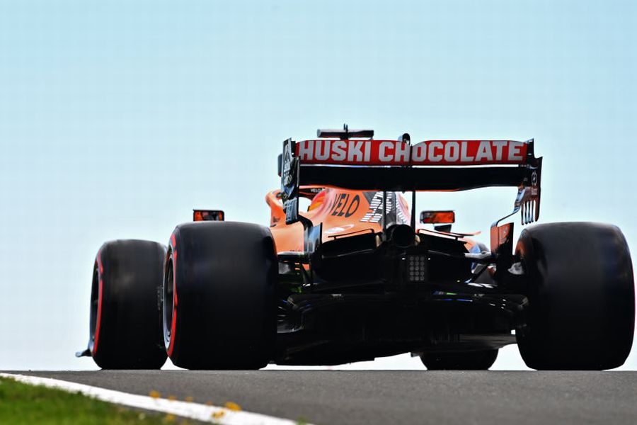 Carlos Sainz Jr heads down the pit lane in the McLaren