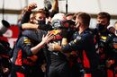 Race winner Max Verstappen celebrates with teammates in parc ferme