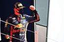 Race winner Max Verstappen celebrates on the podium