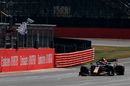 Race winner Max Verstappen takes the chequered flag