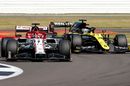 Kimi Raikkonen and Daniel Ricciardo battle for position