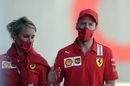 Sebastian Vettel walks in the Paddock