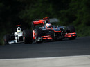 Jenson Button leads Pedro de la Rosa on Friday