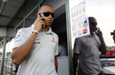 Lewis Hamilton makes a call after practice