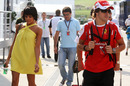 Fernando Alonso arrives in the paddock with his wife Raquel del Rosario 