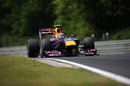 Mark Webber powers up the hill