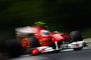 Fernando Alonso flashes past