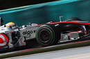 Lewis Hamilton speeds past
