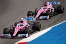 Lance Stroll and Sergio Perez  battle for position