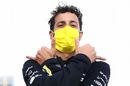 Daniel Ricciardo walks in the paddock
