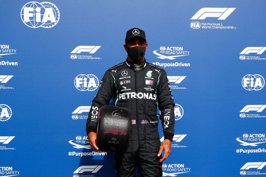 Pole sitter Lewis Hamilton with the Pirelli pole position award