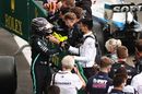 Race winner Lewis Hamilton celebrates with teammates in parc ferme
