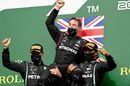 Race winner Lewis Hamilton, Valtteri Bottas celebrate on the podium