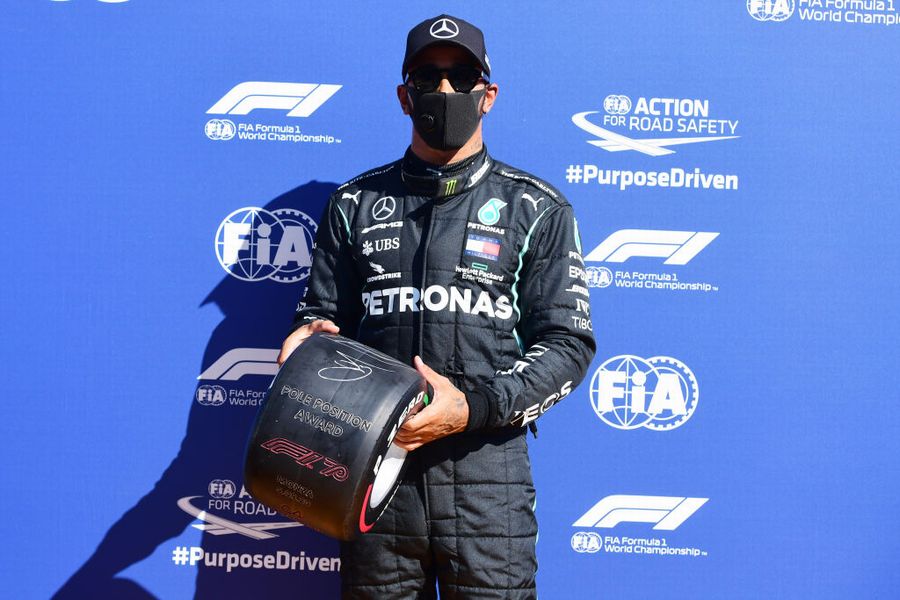 Pole sitter Lewis Hamilton with the Pirelli pole position award