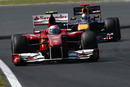 Fernando Alonso keeps Sebastian Vettel behind him