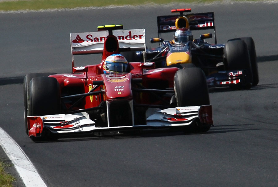 Fernando Alonso keeps Sebastian Vettel behind him