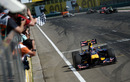 Mark Webber takes the chequered flag for victory