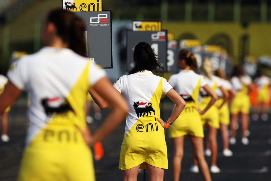Grid girls lined up ahead of a support race