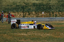 Nigel Mansell retired from the lead of the Hungarian Grand Prix when his right rear wheel nut fell off on lap 70