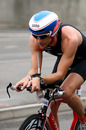 Jenson Button during the bike stage of the London Triathlon