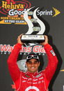 Juan Pablo Montoya with his winners' trophy at the NASCAR Sprint Cup Series at Watkins Glen