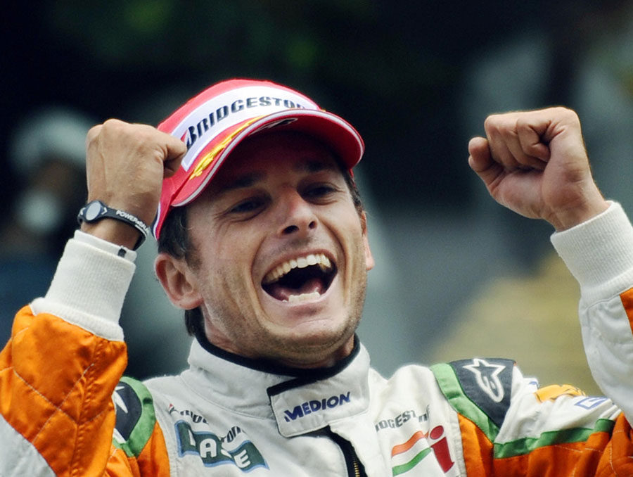 Giancarlo Fisichella celebrates his second place finish at Spa