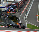 Mark Webber powers through Eau Rouge during qualifying