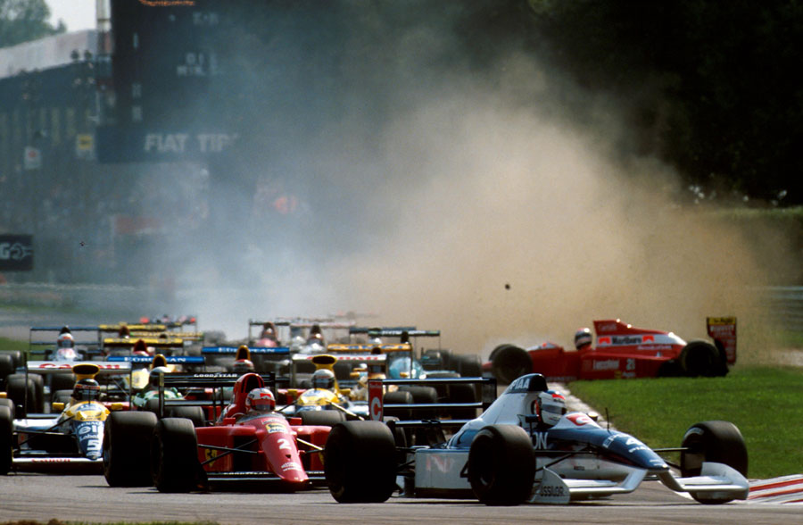 Jean Alesi leads Nigel Mansell at the start of the Italian Grand Prix