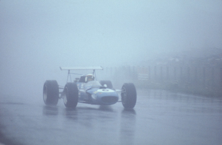 Jackie Stewart picks his way through the rain and fog to win the German Grand Prix by over 4 minutes