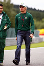 Heikki Kovalainen walks the track
