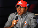 Lewis Hamilton answers a question during the press conference