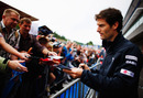 Mark Webber signs autographs