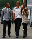 Lewis Hamilton waks with Jenson Button and his girlfriend, Jessica Michibata