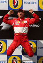 Michael Schumacher celebrates on the podium